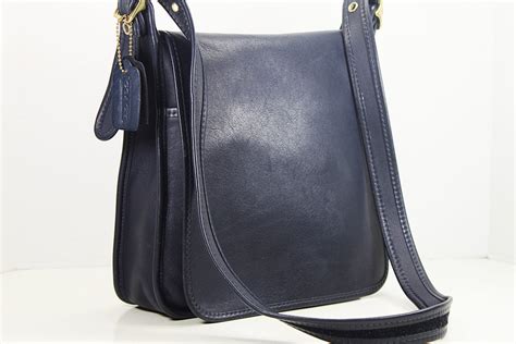 navy blue leather crossbody handbags.